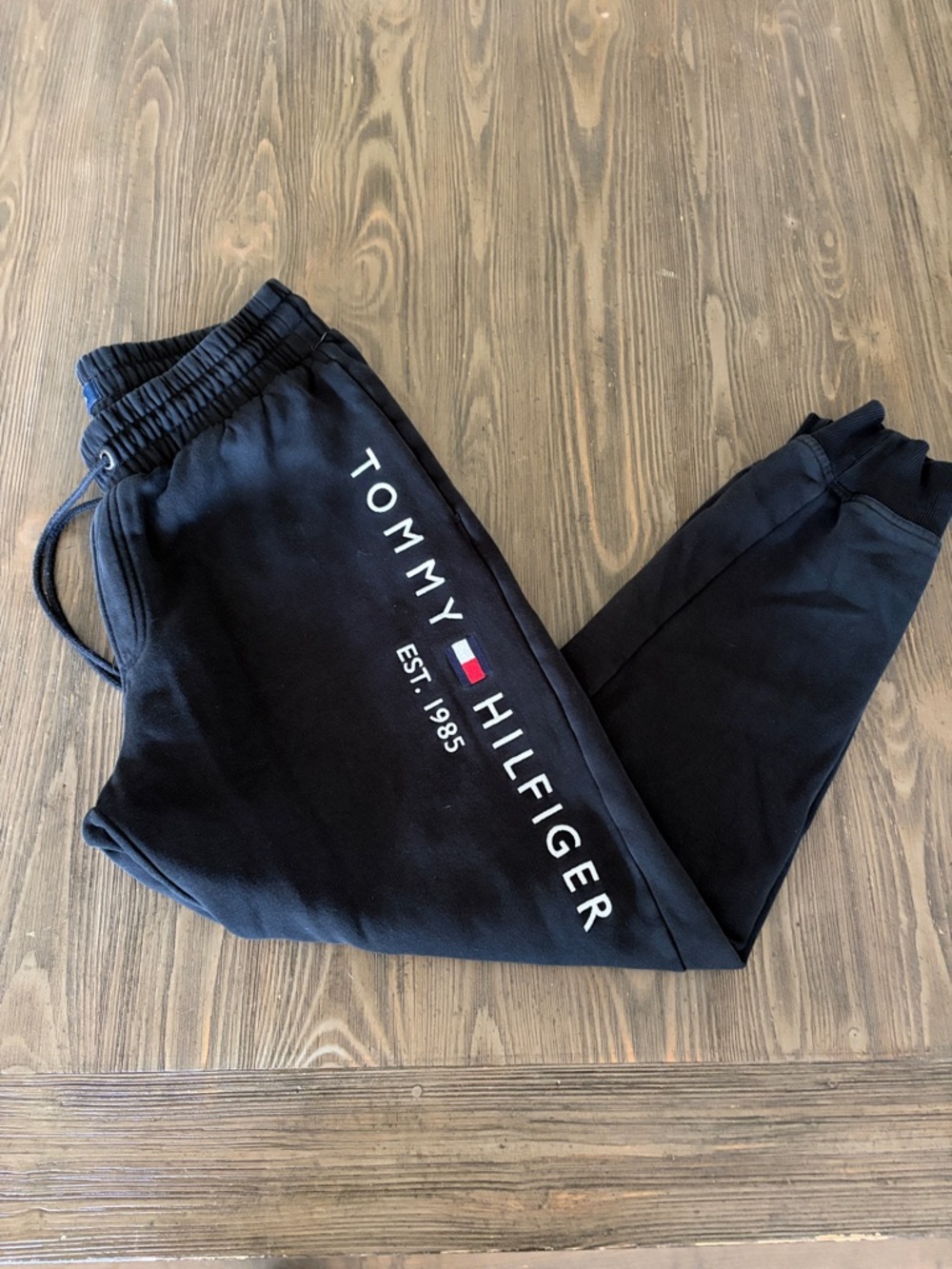 Tommy Hilfiger Black Sweatpants with White Logo and Red-Blue Flag